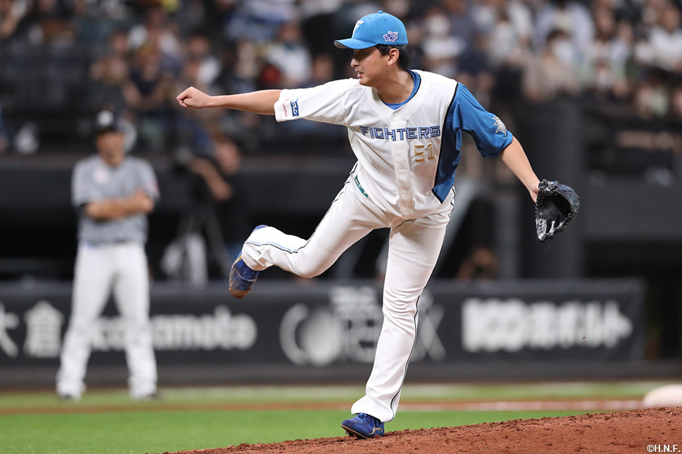 8回、三番手の石川投手