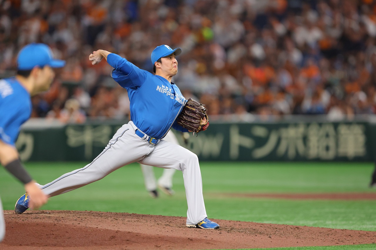 8回、四番手の田中正義投手01