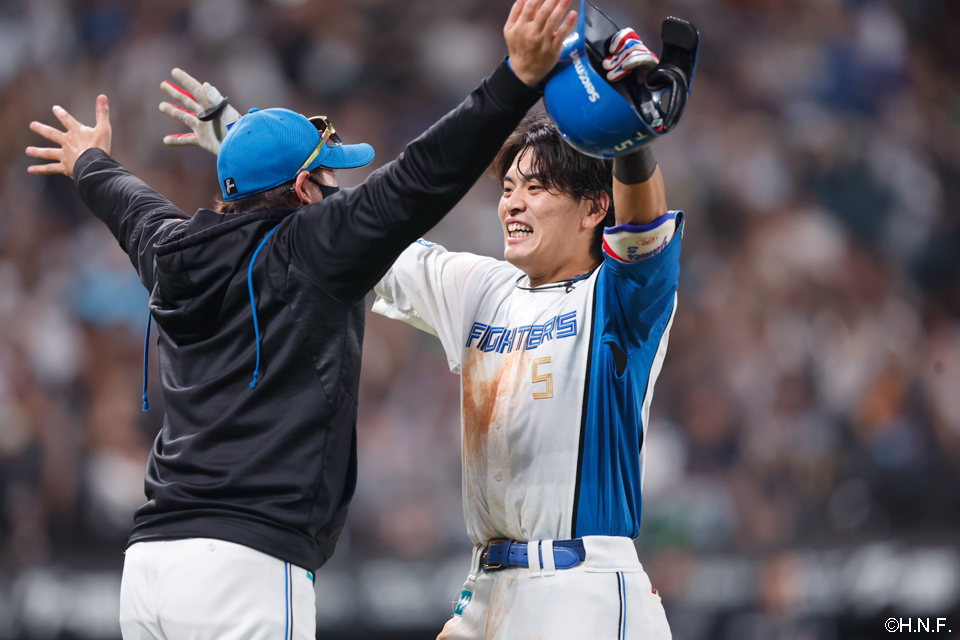 野村選手と新庄監督