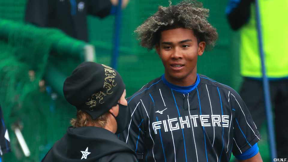 “水谷選手と新庄監督”