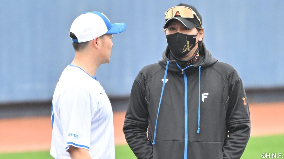 新庄監督と齋藤投手